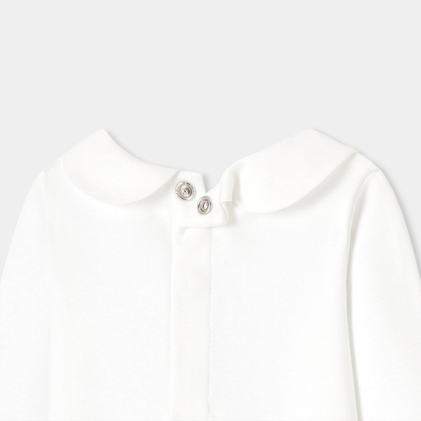 ハート刺しゅう入り長袖ボディスーツ