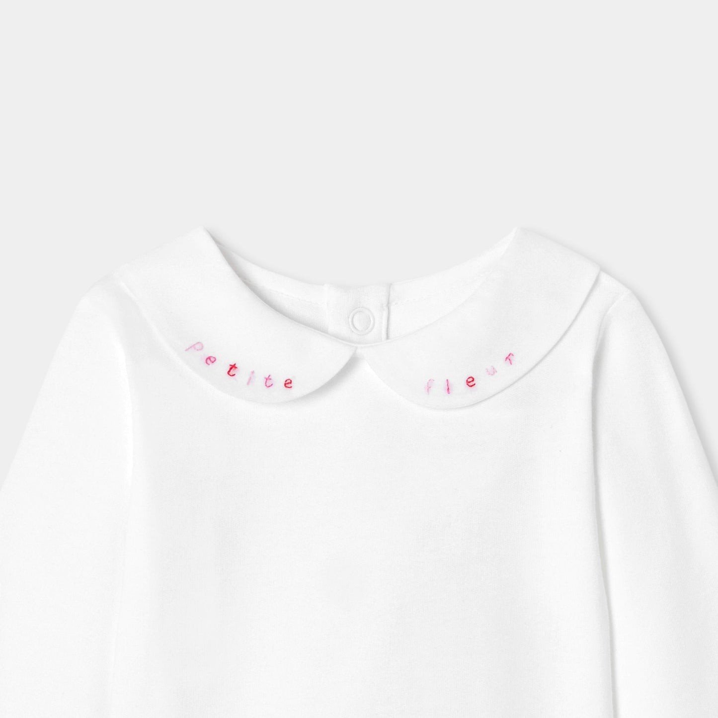 手刺しゅう入り長袖ボディスーツ