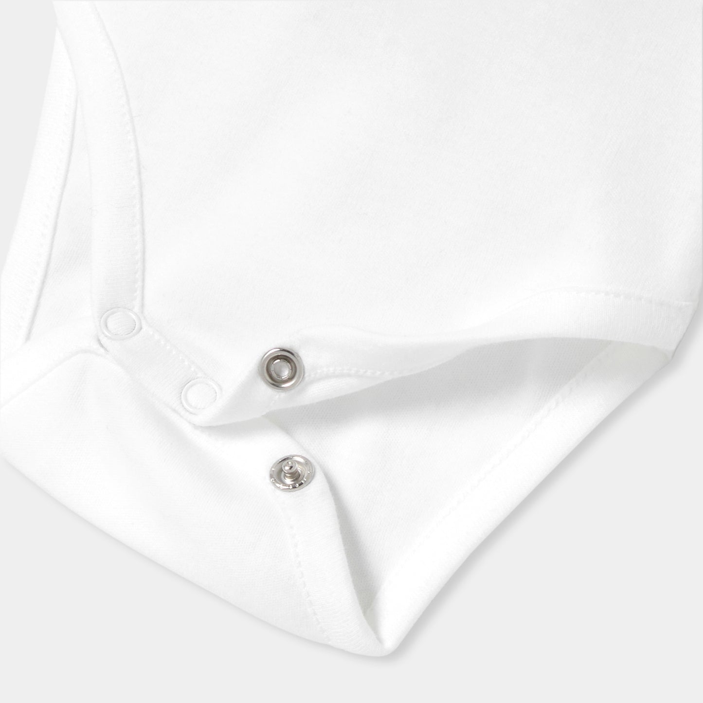 手刺しゅう入り長袖ボディスーツ