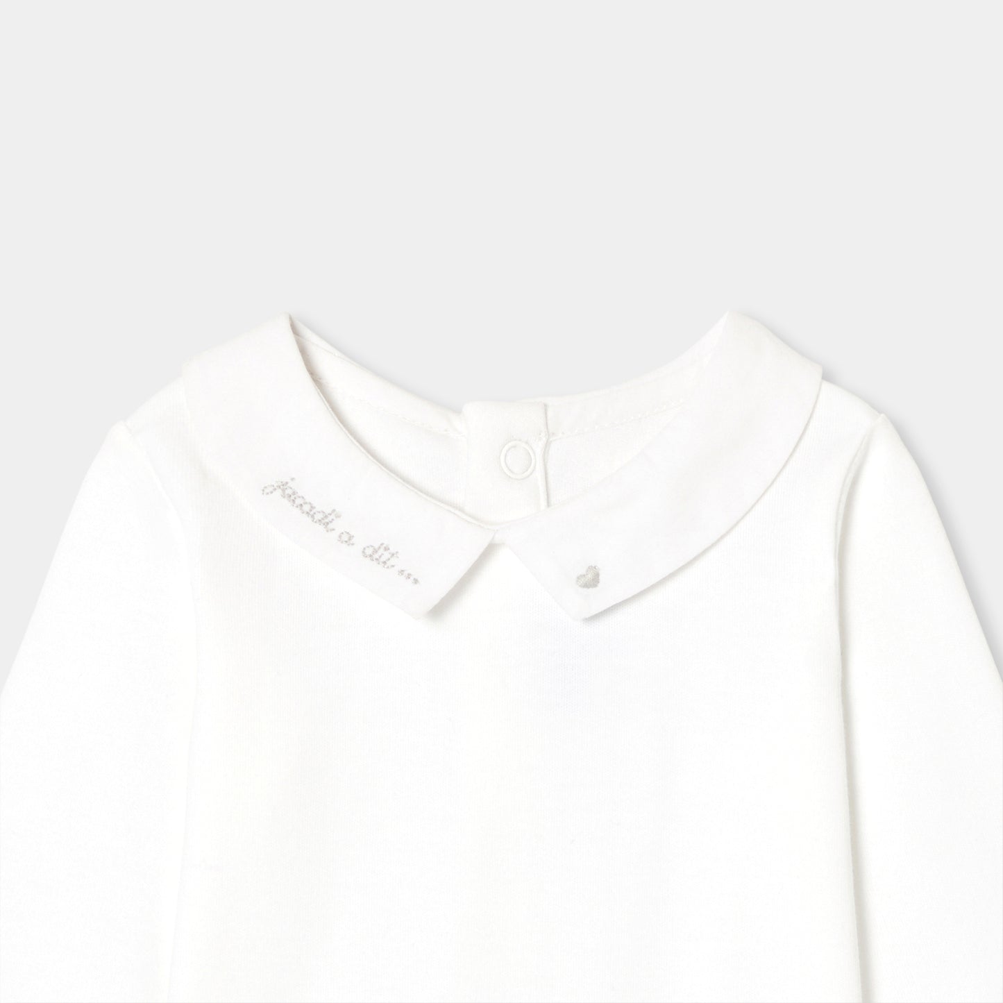 手刺しゅう入り長袖ボディスーツ