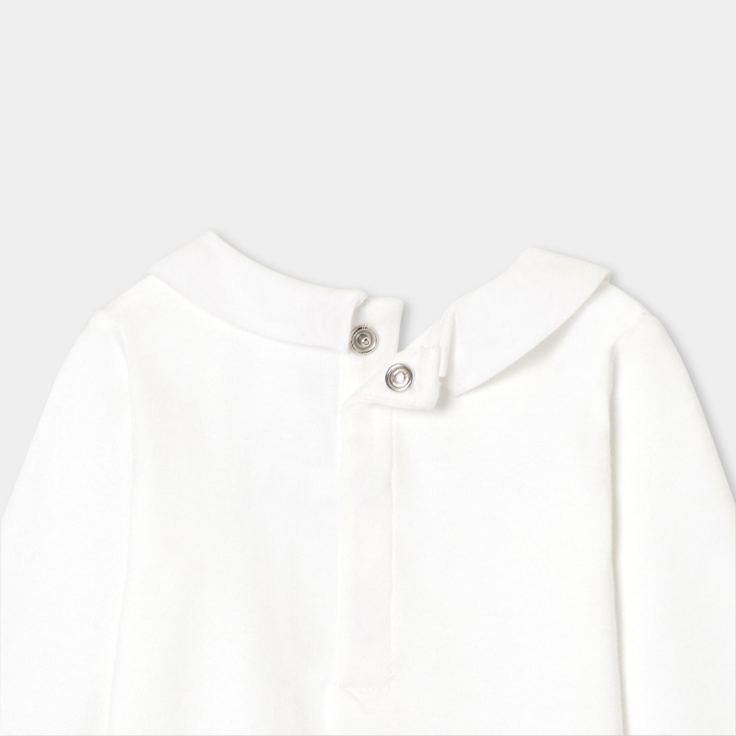 手刺しゅう入り長袖ボディスーツ