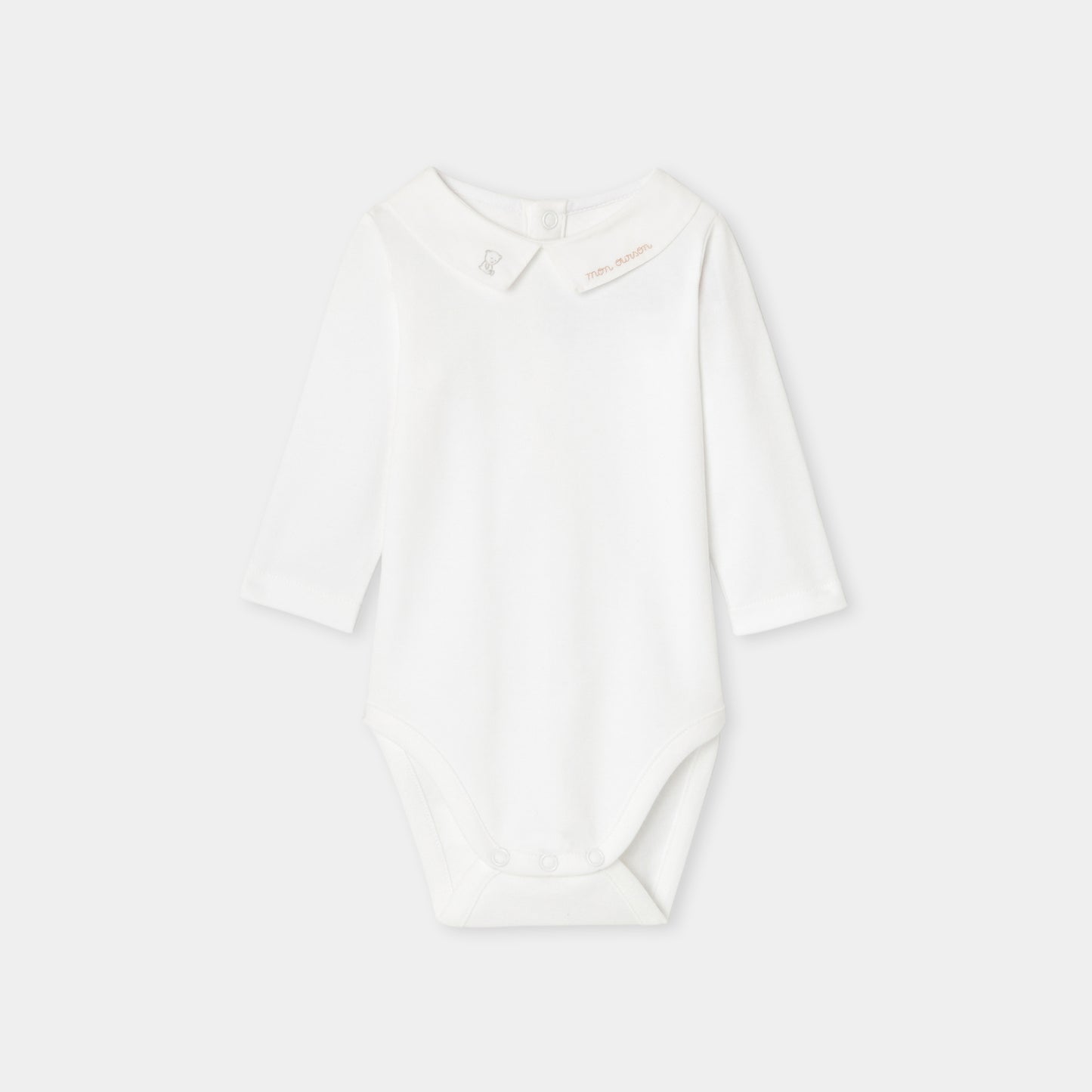 文字刺しゅう入り長袖ボディスーツ