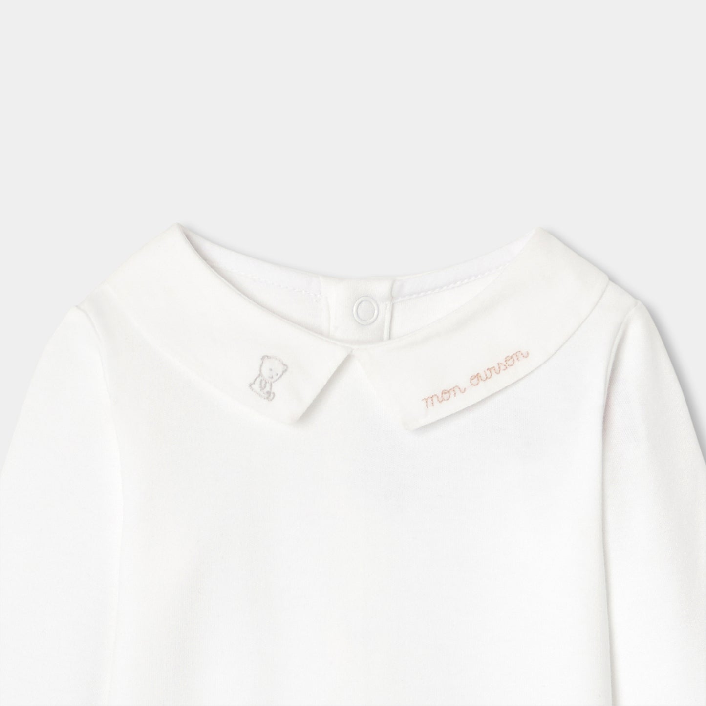 文字刺しゅう入り長袖ボディスーツ