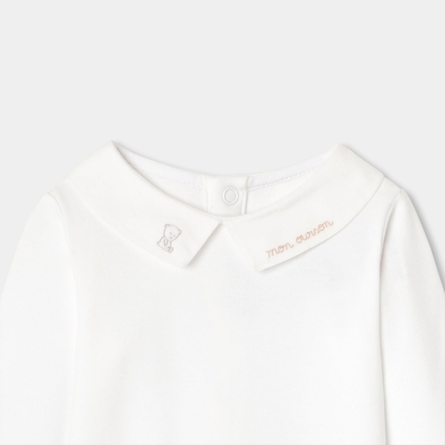 文字刺しゅう入り長袖ボディスーツ