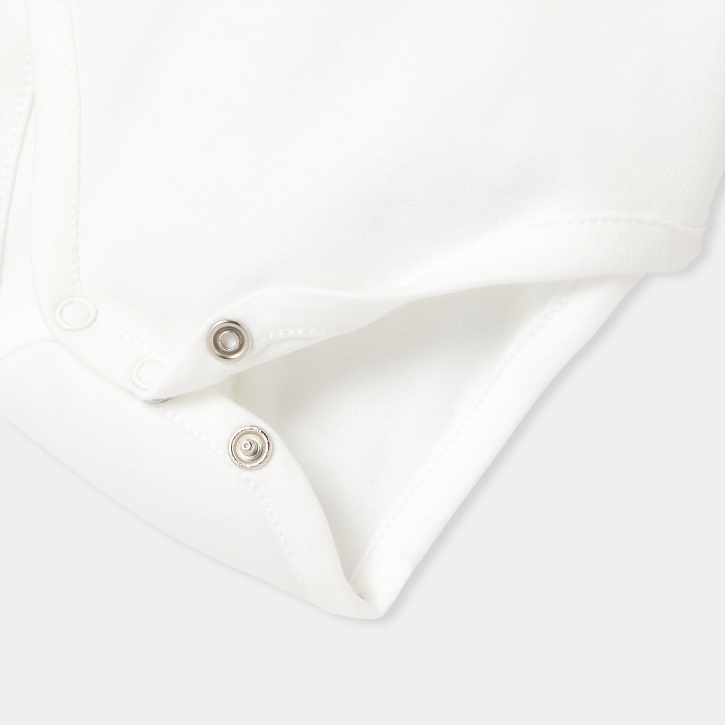 文字刺しゅう入り長袖ボディスーツ