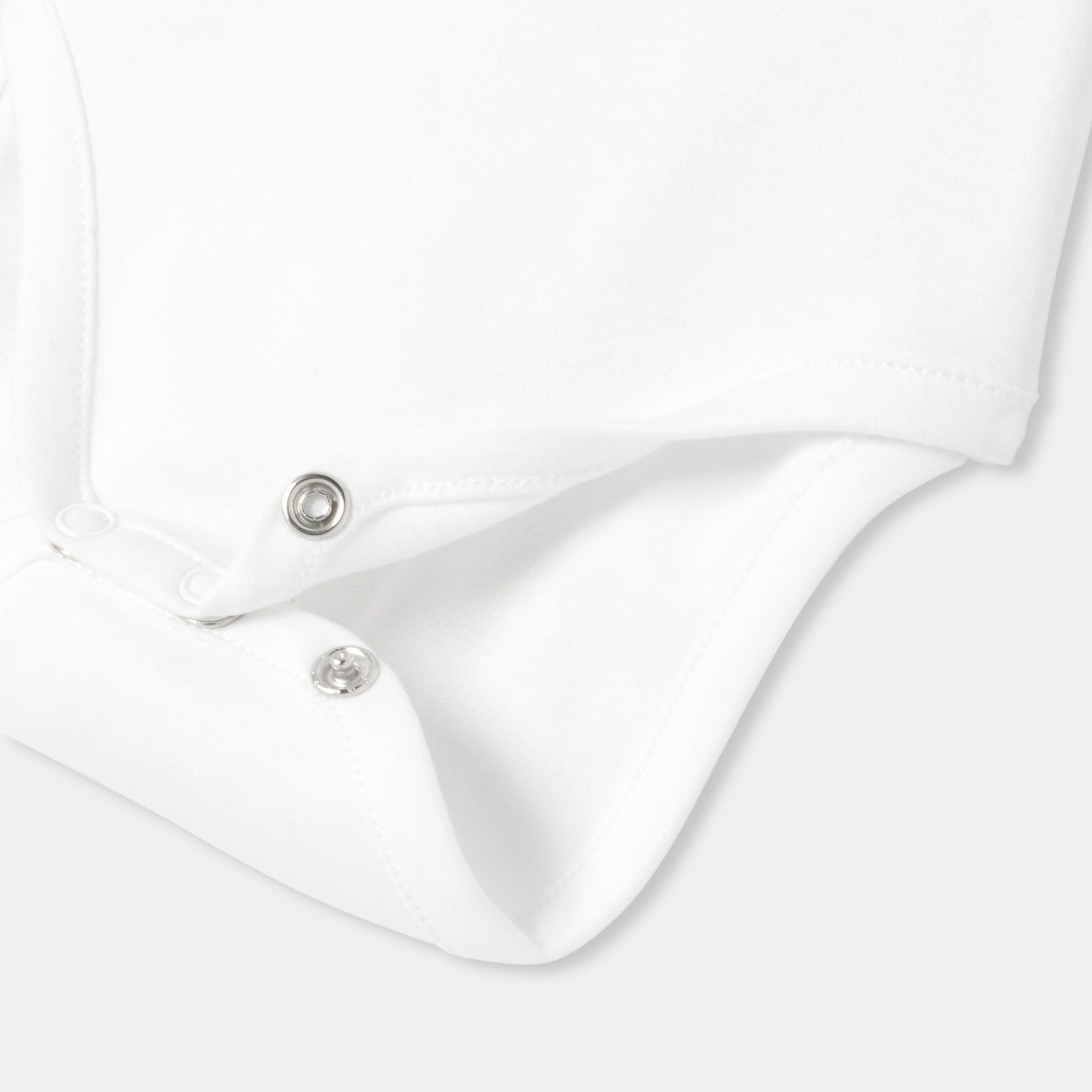 手刺しゅう入り長袖ボディスーツ