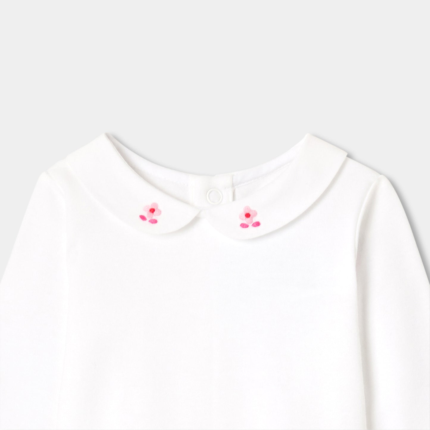 フラワー手刺しゅう入りボディスーツ